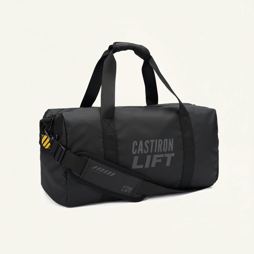 Black gym bag with the 'CASTIRON LIFT' brand logo on the side, featuring a shoulder strap and a zipper.